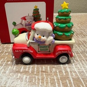 Hallmark Keepsake Ornament “Holiday Parade” Snowman in Red Truck-Baking Theme